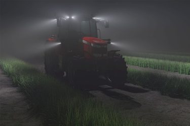 Traktor munkalámpával sötétben